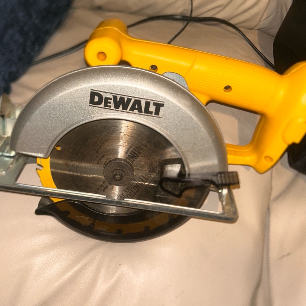 Yellow and Silver Circular Saw